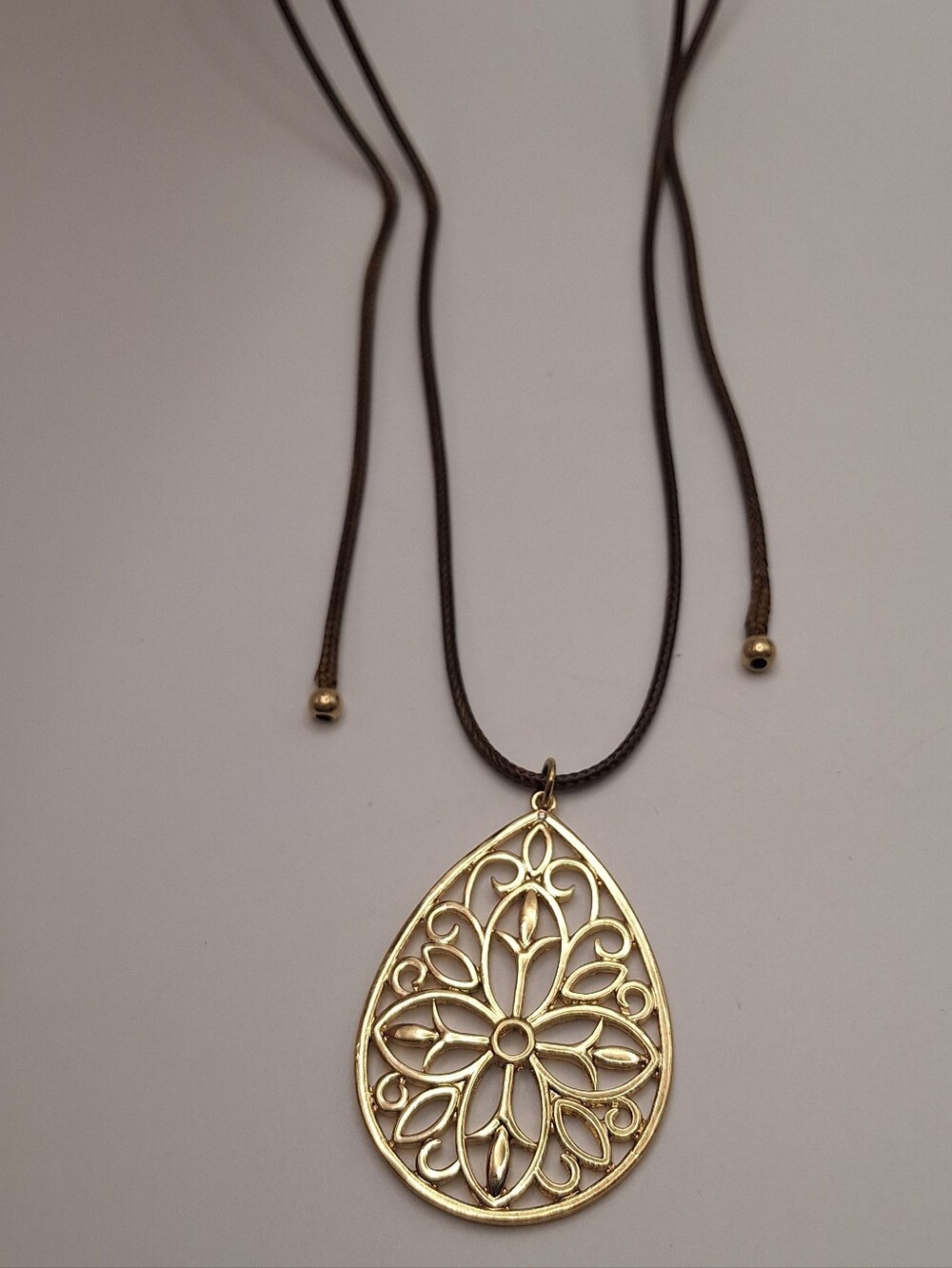 NWT Gold Tone Filigree Teardrop Pendant Brown Cord Boho Necklace